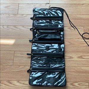 8 compartment foldable accessories travel bag.
